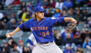 New York Mets starting pitcher Noah Syndergaard throws during the first inning of a baseball game against the Chicago Cubs on Tuesday, May 12, 2015, in Chicago. (AP Photo/Charles Rex Arbogast)