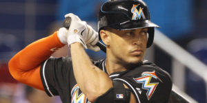 MIAMI, FL - SEPTEMBER 06:  Giancarlo Stanton #27 of the Miami Marlins bats against the Atanta Braves during the first inning at Marlins Park on September 6, 2014 in Miami, Florida. The Braves defeated the Marlins 4-3.  (Photo by Marc Serota/Getty Images)